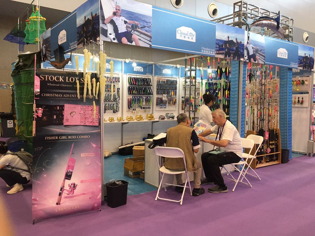 Opening morning at the Chinalure booth E2 2125 with buyers from Singapore and Australia at the sample table
