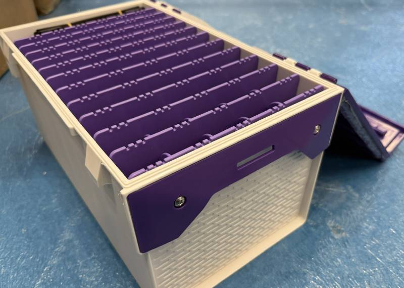 CL26-05 bait tray from the side with the lid off, ribbed wall and purple divider block